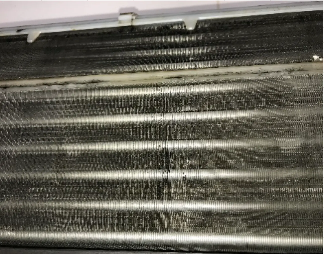 [洗浄前のアルミフィンの画像]